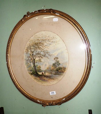 Lot 456 - Oval faded watercolour by T J Baker, figures by ruins