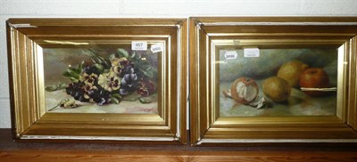 Lot 467 - Pair of gilt framed oils, still lives of pansies and oranges, signed H. Snow