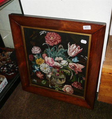 Lot 477 - A floral needlework panel in a glazed rosewood frame