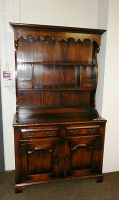 Lot 510 - A reproduction oak dresser and rack with mahogany cross banding