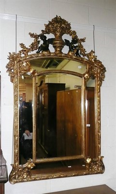 Lot 515 - Large reproduction gilt framed mirror with cherubs