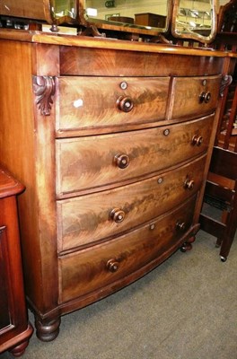 Lot 528 - A Victorian mahogany bow front chest of drawers and walnut bed ends