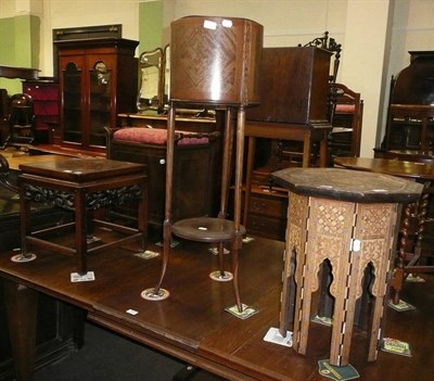 Lot 539 - An Eastern table, a plant stand and another on a tripod base