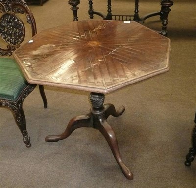 Lot 563 - A 19th Century mahogany tripod table with octagonal inlaid top