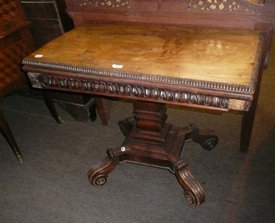 Lot 565 - Regency mahogany fold over card table