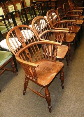 Lot 579 - A composite set of six 19th Century Windsor armchairs