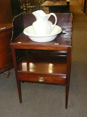 Lot 601 - Georgian mahogany washstand with a pottery jug and bowl