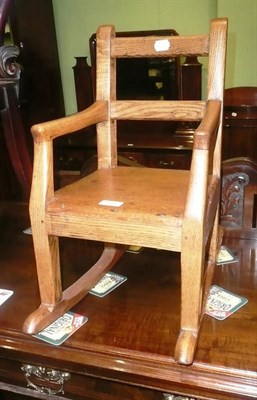 Lot 613 - Child's pine rocking chair