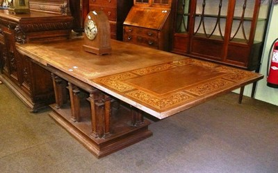 Lot 626 - A continental walnut extending table