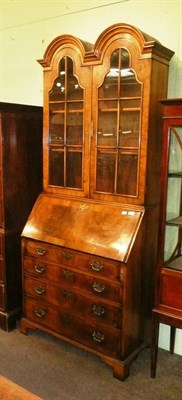 Lot 632 - Walnut bureau bookcase