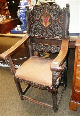 Lot 637 - Continental walnut open armchair