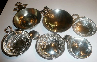Lot 5 - Six silver and white metal wine tasters including a Tiffany example