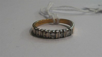 Lot 14 - An 18ct gold diamond five stone ring