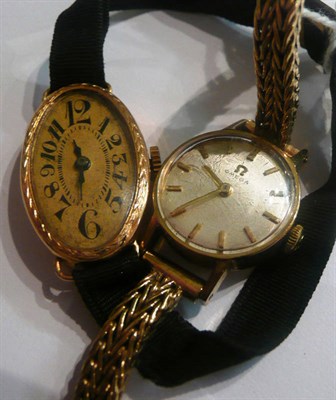 Lot 34 - A lady's 9ct gold Omega wristwatch and an oval wristwatch with graduated Arabic numerals, case...