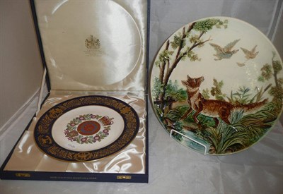 Lot 65 - A Majolica dish decorated with a fox and a commemorative plate