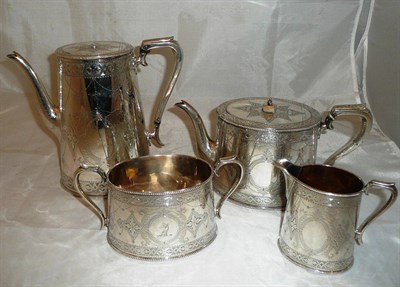 Lot 68 - A Victorian four piece silver tea service with engraved decoration and bearing the 'Lister' coat of