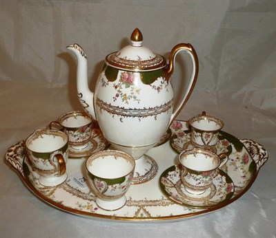 Lot 75 - A Wedgwood tete-a-tete comprising coffee pot, sugar bowl, milk jug, four cups and saucers