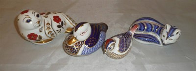 Lot 76 - Four Royal Crown Derby paperweights, seal, bird, duck and fox - all with gold stoppers, three boxed