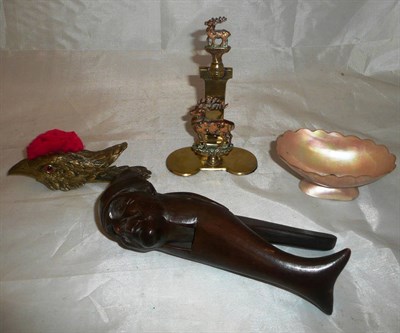 Lot 97 - A cockerel head patent letter clip, a carved nutcracker, a letter rack and a mother-of-pearl tidy