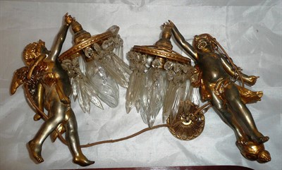 Lot 105 - Two gilt metal cherub lights