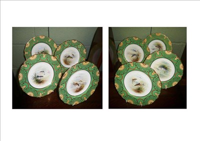 Lot 123 - A set of eight Wedgwood cabinet plates each painted with a freshwater fish, retailed by 'T Good...