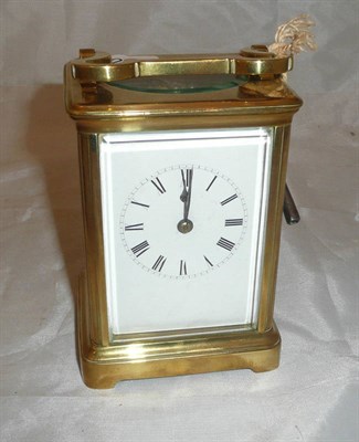 Lot 126 - A brass carriage clock