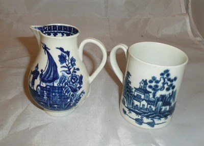 Lot 129 - A First Period Worcester sparrow-beak jug and a cup