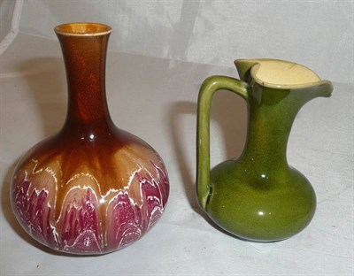 Lot 135 - A small Linthorpe vase and a small green glazed Linthorpe jug (a.f.)