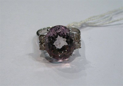 Lot 174 - A 14ct white gold kunzite and diamond ring