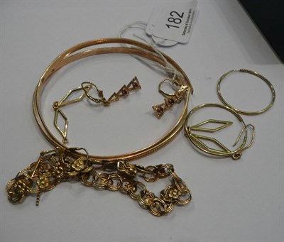 Lot 182 - Quantity of small gold - two 10k bangles, two pairs of earrings, 14k bracelet, 28g approx