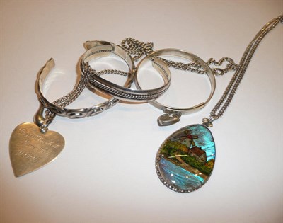 Lot 203 - Tiffany silver bangle and heart pendant, two bracelets and locket