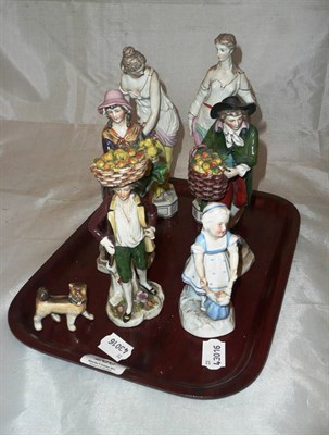 Lot 260 - Six Continental figural groups and a small dog figure