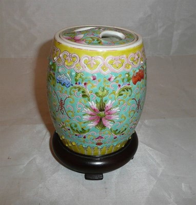 Lot 291 - A 19th century Canton porcelain 'barrel' jar, cover and stand