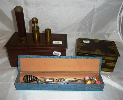 Lot 302 - Small telescope, hinged tin, hat pins, etc