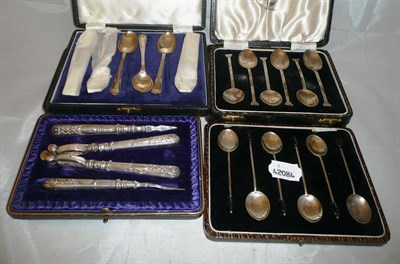 Lot 305 - Three cased sets of tea and coffee spoons, and a cased set of nutcrackers and picks (4)