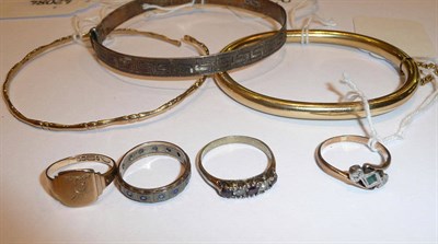 Lot 316 - 9ct gold bangle, hollow bangle, silver bangle and four rings