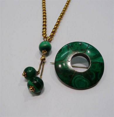 Lot 330 - Malachite brooch and a malachite pendant on gold plated chain.