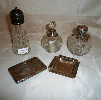 Lot 341 - A silver aide-memoire, silver ashtray, two scents and a sugar caster