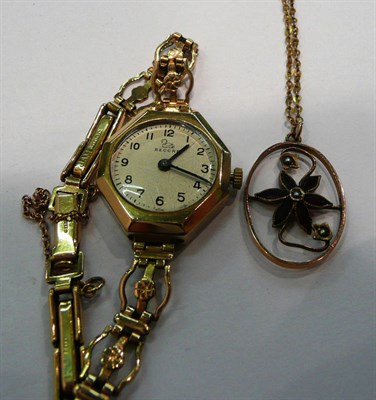 Lot 358 - Gold watch and gold pendant on chain