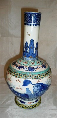 Lot 371 - A Chinese 19th century blue and white enamelled bottle vase