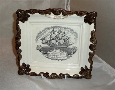 Lot 388 - A 19th century Pearlware plaque 'May Peace On Our Nation Smile'