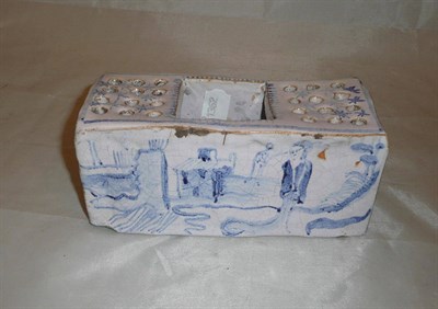 Lot 420 - A Delft brick flower holder (a.f.)