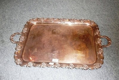 Lot 429 - A silver plate twin handled tray with C scroll vine cast decoration