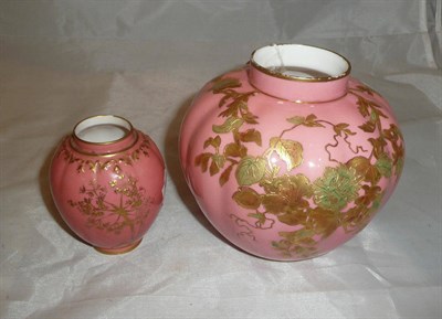 Lot 430 - A Royal Crown Derby pink ground and gilt-decorated vase and a smaller example