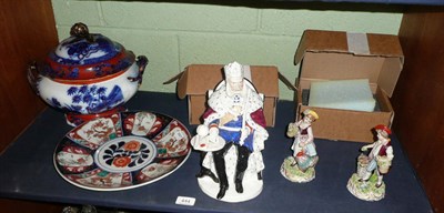 Lot 444 - A figural tobacco jar, tureen and cover, small charger and two Continental figures