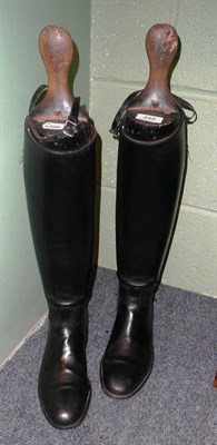 Lot 448 - A pair of leather riding boots with wooden trees