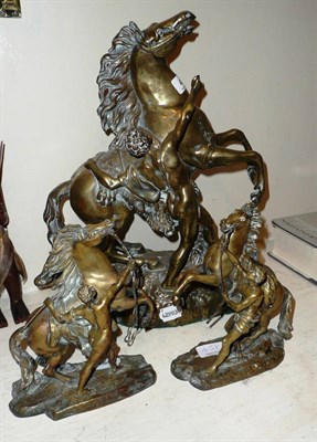 Lot 451 - A pair of Marley horses and a larger example