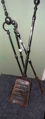 Lot 460 - A set of three polished steel fire irons