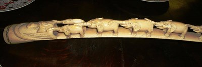 Lot 499 - A carved ivory tusk, elephant procession