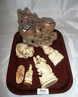 Lot 506 - Three Oriental carved walrus figures, carved ivory group (a.f.) and a soapstone piece